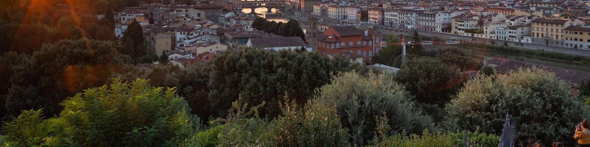 Piazzale Michelangelo showing landscape views, a sunset and a city
