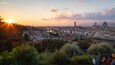 Piazzale Michelangelo showing landscape views, a sunset and a city