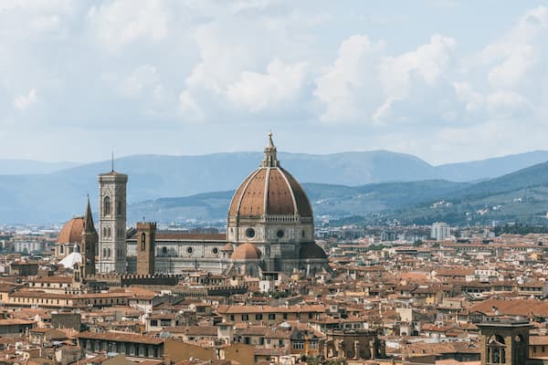 Piazzale Michelangelo showing a city, landscape views and heritage architecture