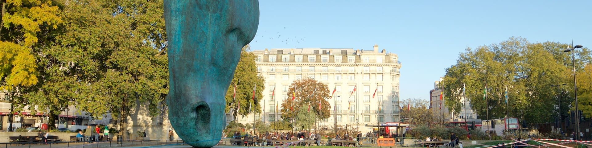 Hyde Park Corner featuring a park and a statue or sculpture