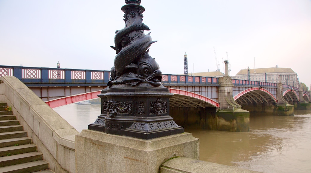 Lambeth Bridge featuring a river or creek and a bridge