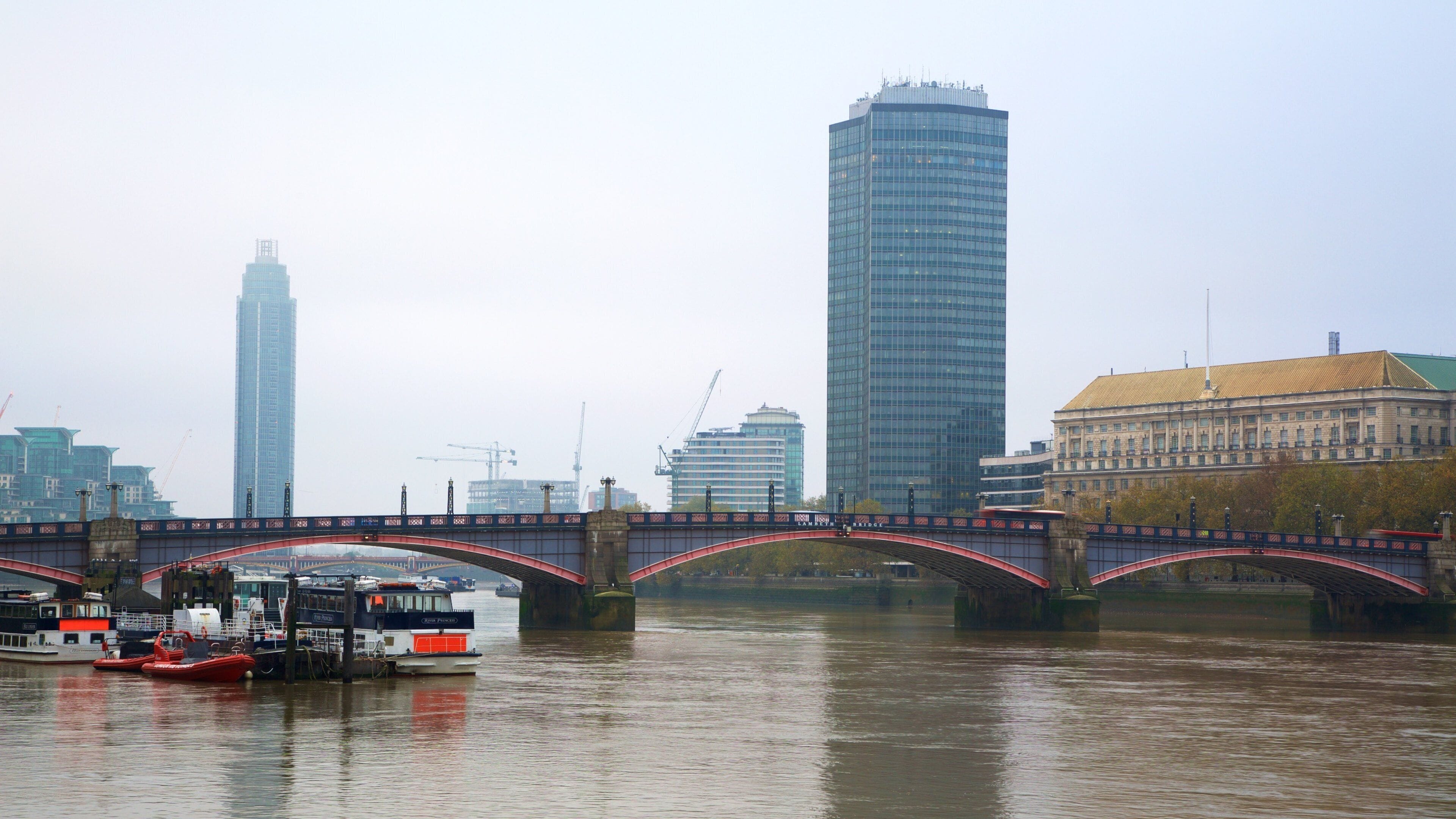 Lambeth Bridge featuring a bridge, a marina and a high rise building