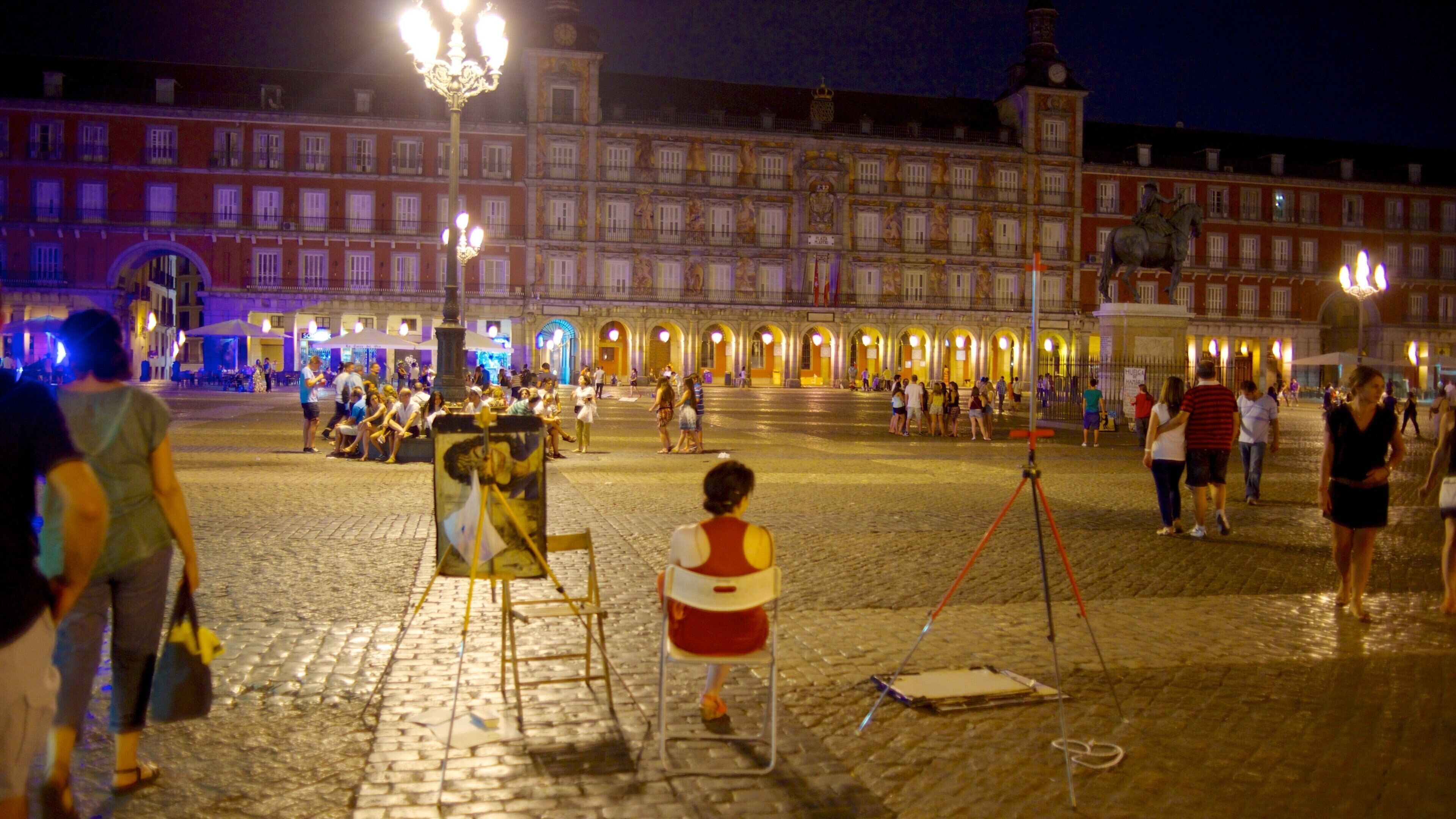 Plaza Mayor which includes heritage architecture, a city and night scenes