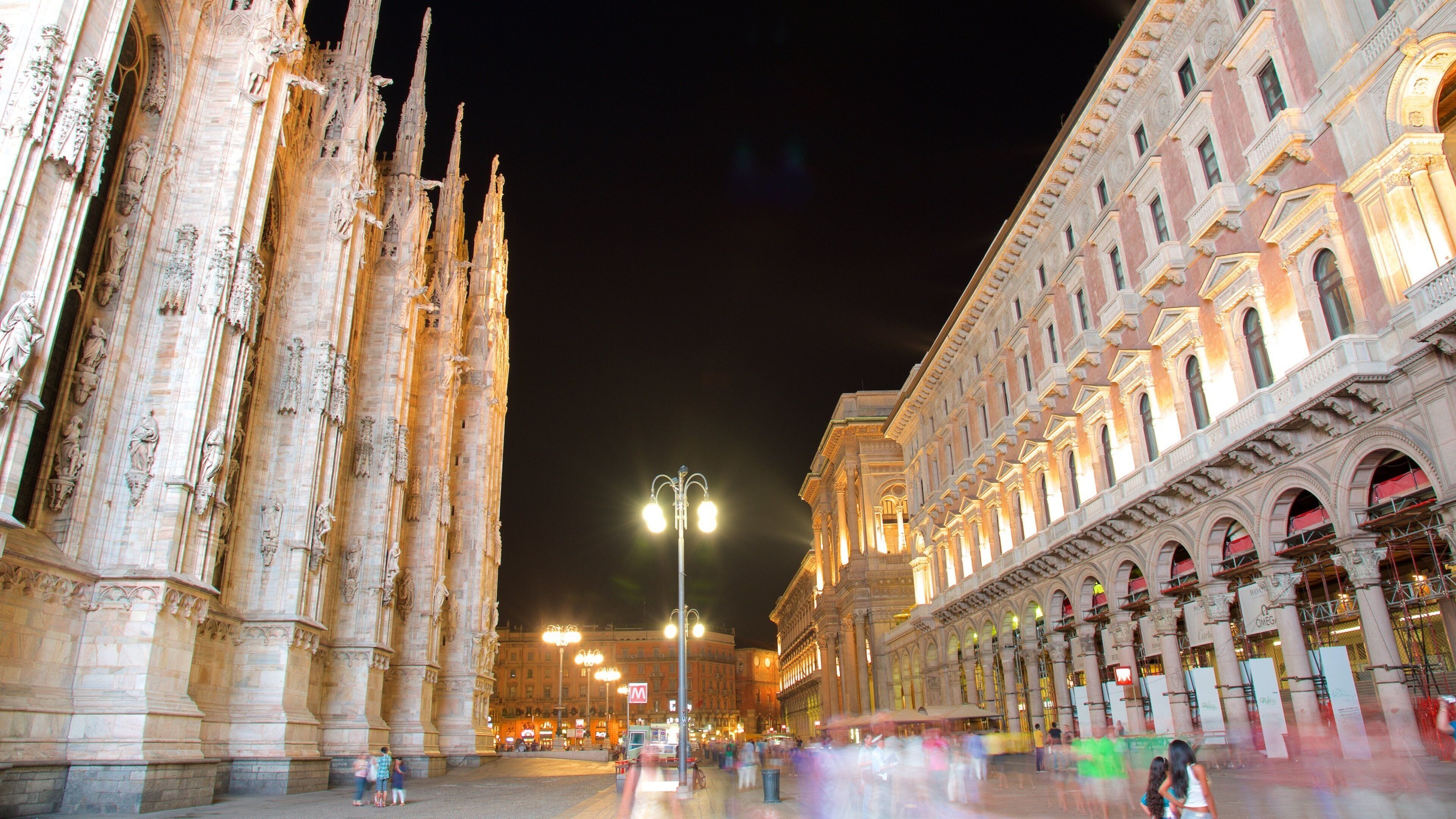 Piazza del Duomo featuring a church or cathedral, street scenes and heritage architecture
