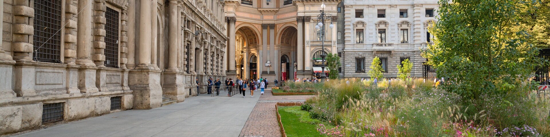 Piazza della Scala which includes a park and wildflowers