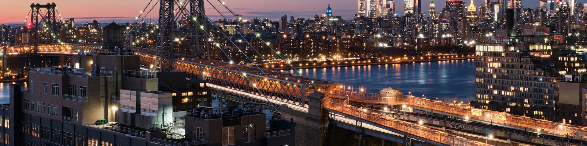 Williamsburg bridge and Midtown Manhattan skyline.
