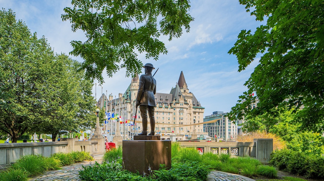 Confederation Square which includes heritage architecture and a statue or sculpture
