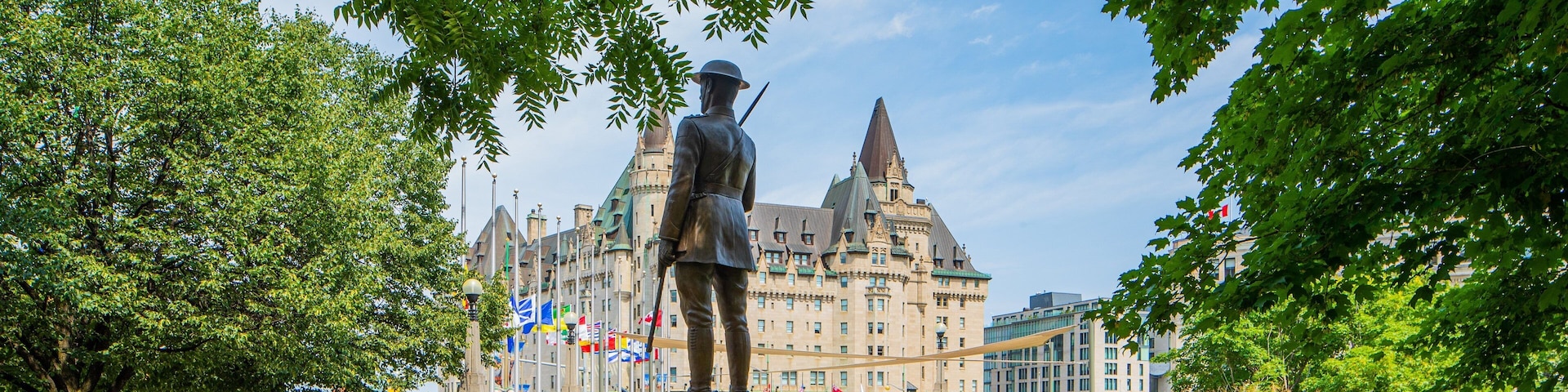 Confederation Square which includes heritage architecture and a statue or sculpture