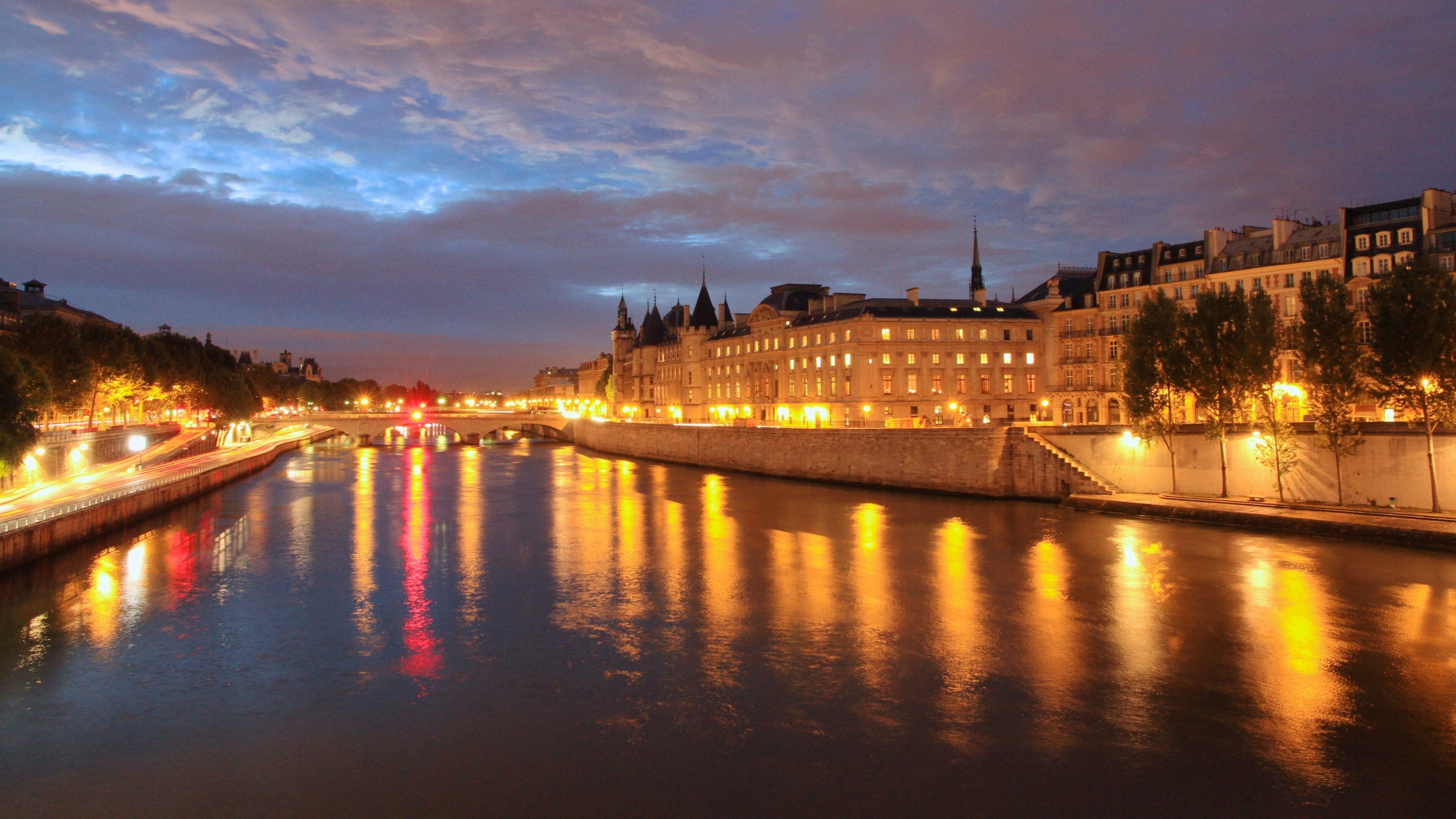 Place de la Concorde featuring night scenes, a river or creek and a city
