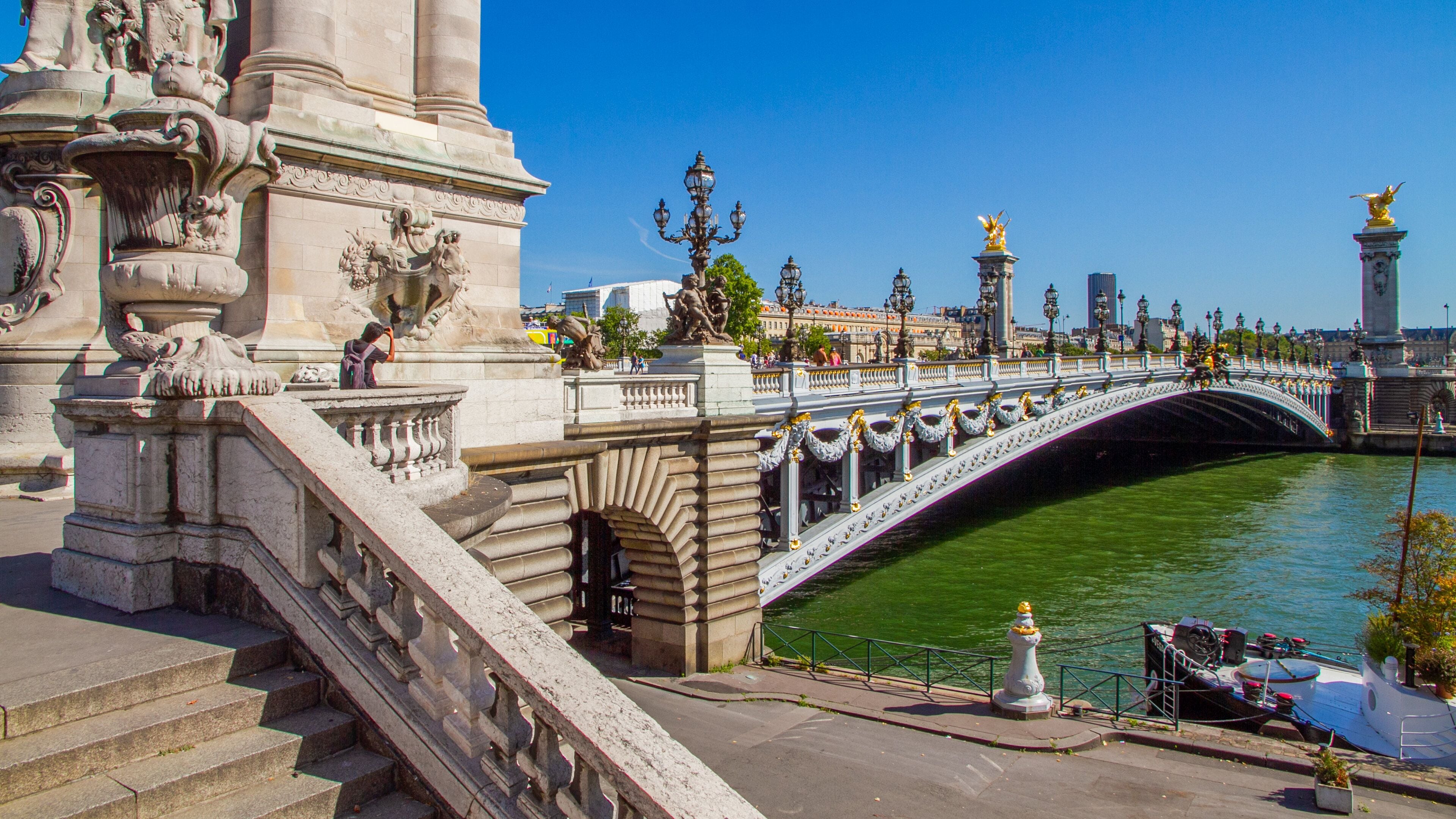 Pont Alexandre-III which includes a bridge, a river or creek and heritage elements