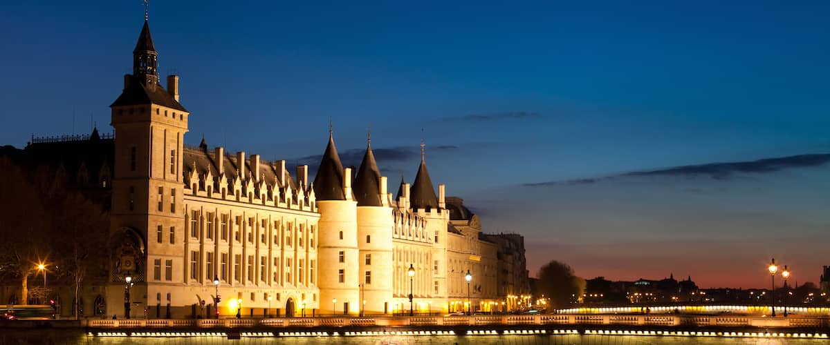 The Pont au Change, bridge over river Seine and the Conciergerie, a former royal palace and prison in Paris, France
