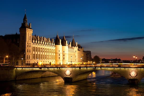 The Pont au Change, bridge over river Seine and the Conciergerie, a former royal palace and prison in Paris, France