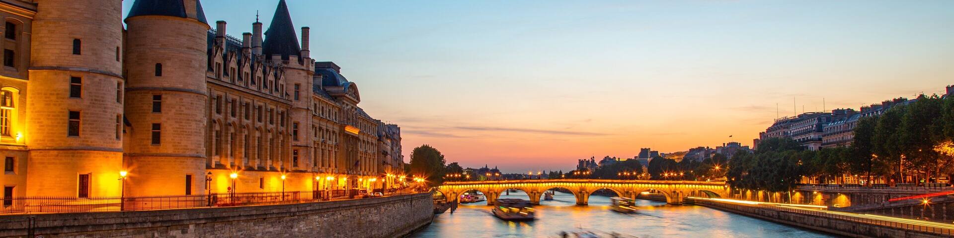 Pont Neuf showing a sunset, a river or creek and night scenes