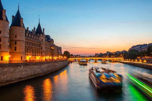 Pont Neuf showing a sunset, a river or creek and night scenes