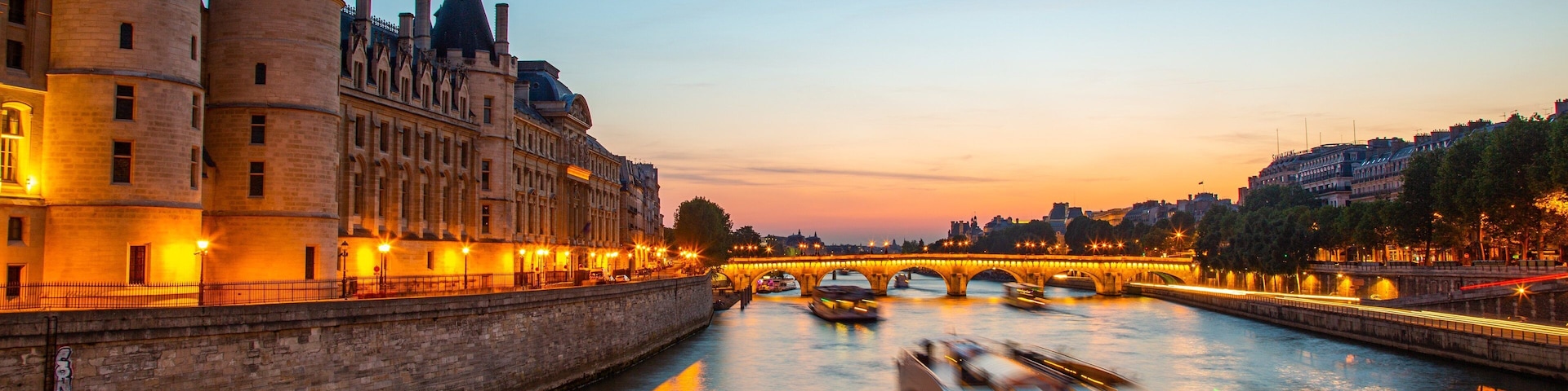 Pont Neuf showing a sunset, a river or creek and night scenes