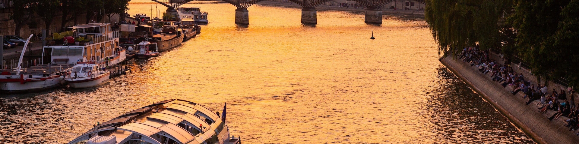 Pont Neuf featuring a sunset, a river or creek and boating