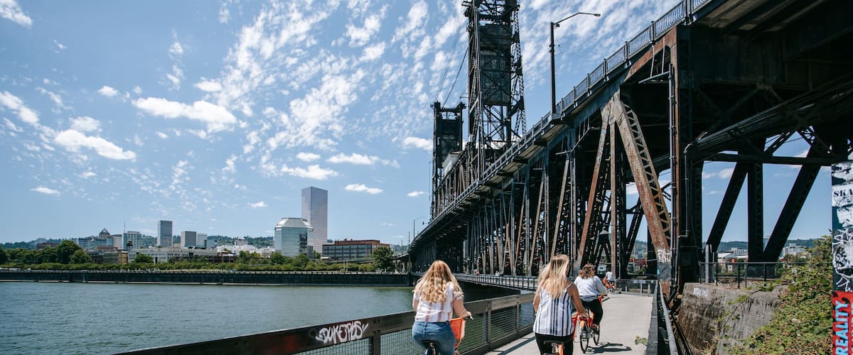 Steel Bridge which includes a bridge, a river or creek and cycling