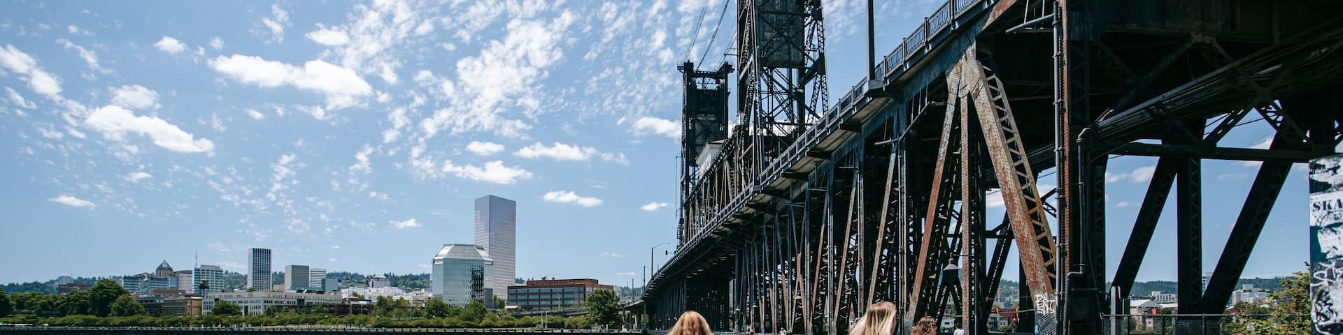 Steel Bridge which includes a bridge, a river or creek and cycling