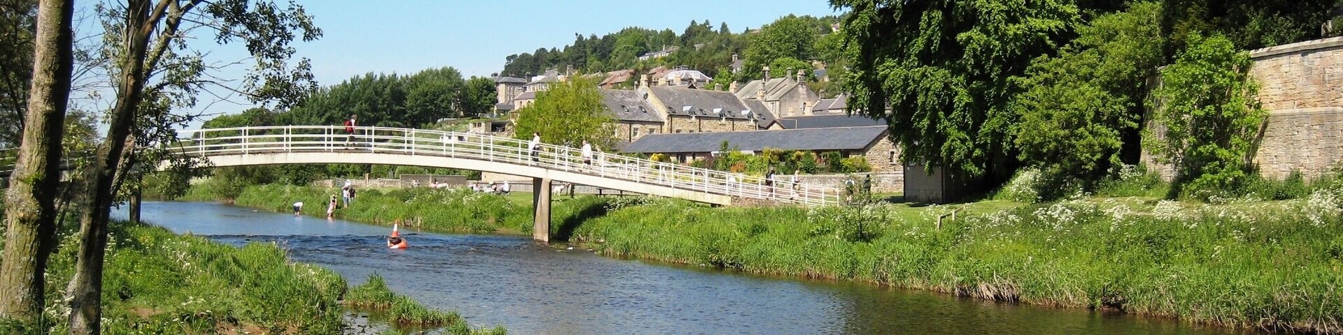 River Coquet at Rothbury This photograph shows a view of the footbridge over the River Coquet at Rothbury. The picture was taken looking in a westerly direction towards Beggars Rigg.