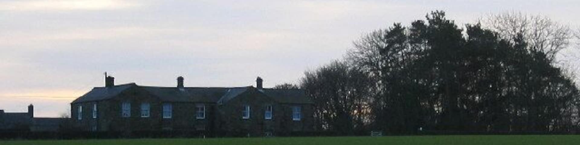 Catraw. The old farmhouse at Catraw was demolished about 1970 and was possibly a 'bastle'. The new buildings look rather more forbidding at dusk than they do in daylight!