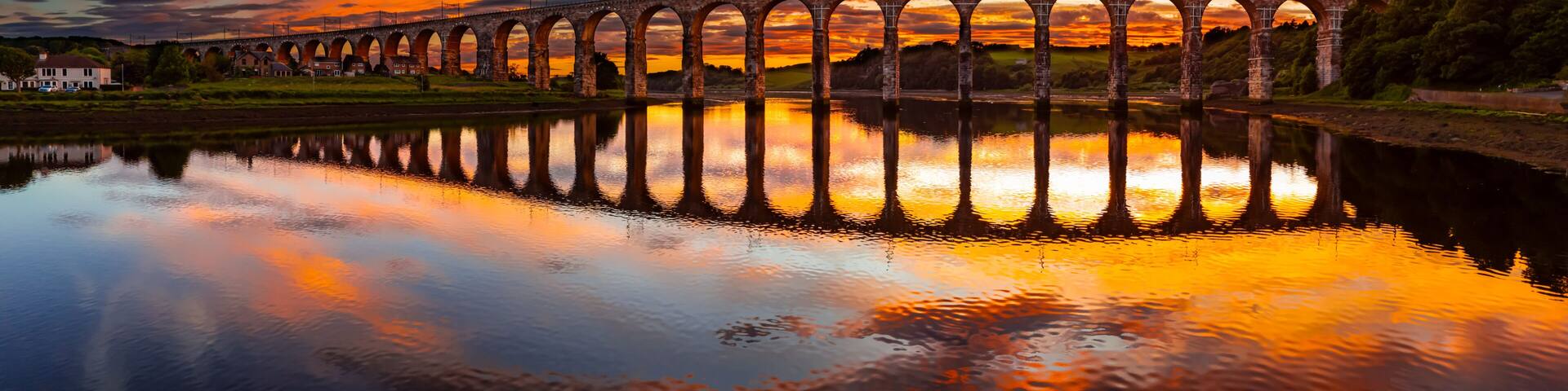 Berwick, Northumberland, UK, June 19, 2024; sunset aerial view of the Royal Border Bridge Viaduct, Berwick, Berwick-upon-Tweed, Northumberland, England, UK.