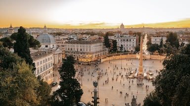 Piazza del Popolo featuring landscape views, a sunset and a square or plaza