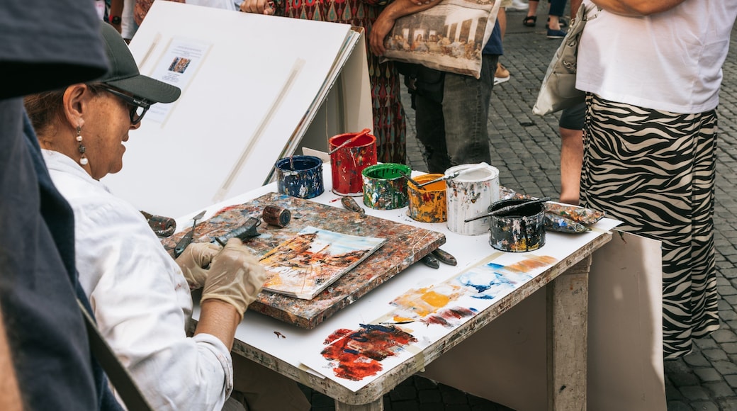 Piazza Navona featuring street scenes, art and outdoor art