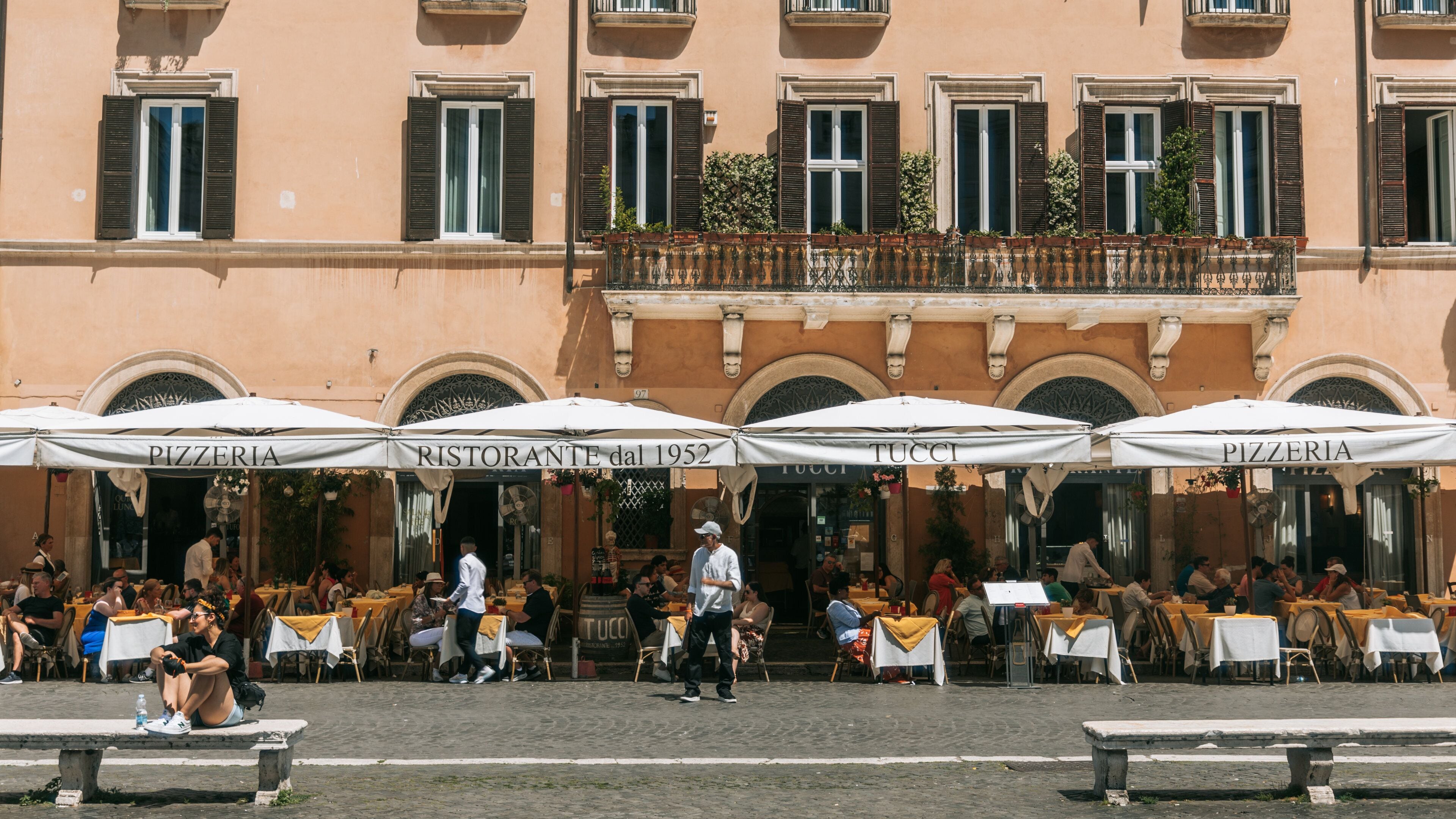 Piazza Navona which includes street scenes and outdoor eating