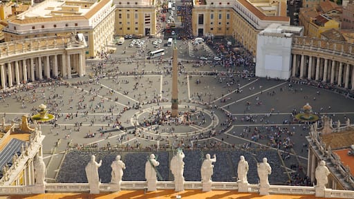 Visit to St. Peter's Square, a bustling gathering place in Rome, inviting exploration and reflection on a sunny day