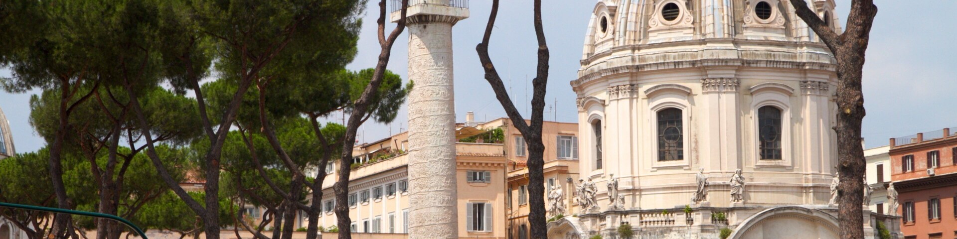 Exploring the architectural beauty of Piazza Venezia in Rome, Lazio, showcasing historical structures and lush greenery
