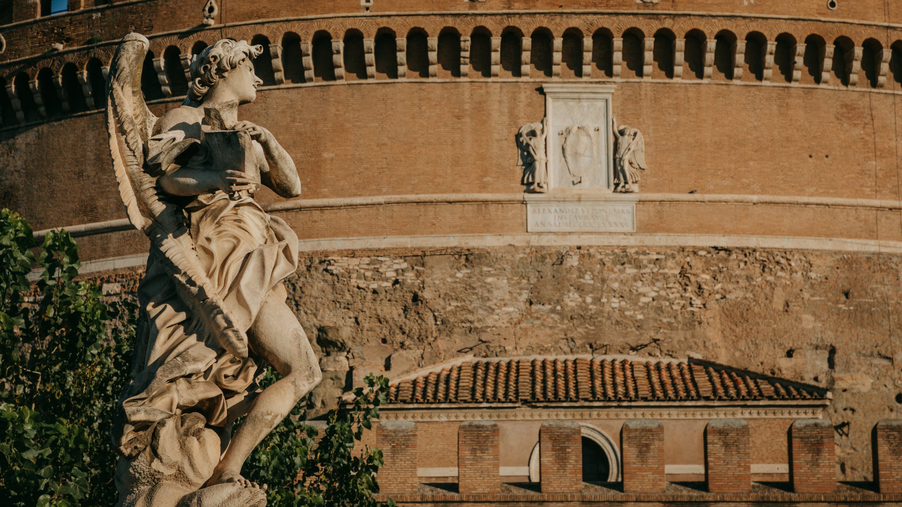 Ponte Sant\'Angelo showing a statue or sculpture and heritage elements