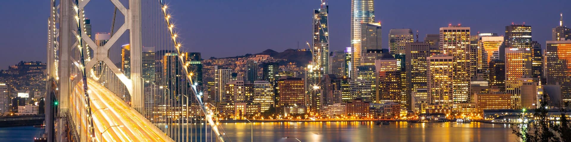 Bay Bridge showing a bridge, a bay or harbor and night scenes