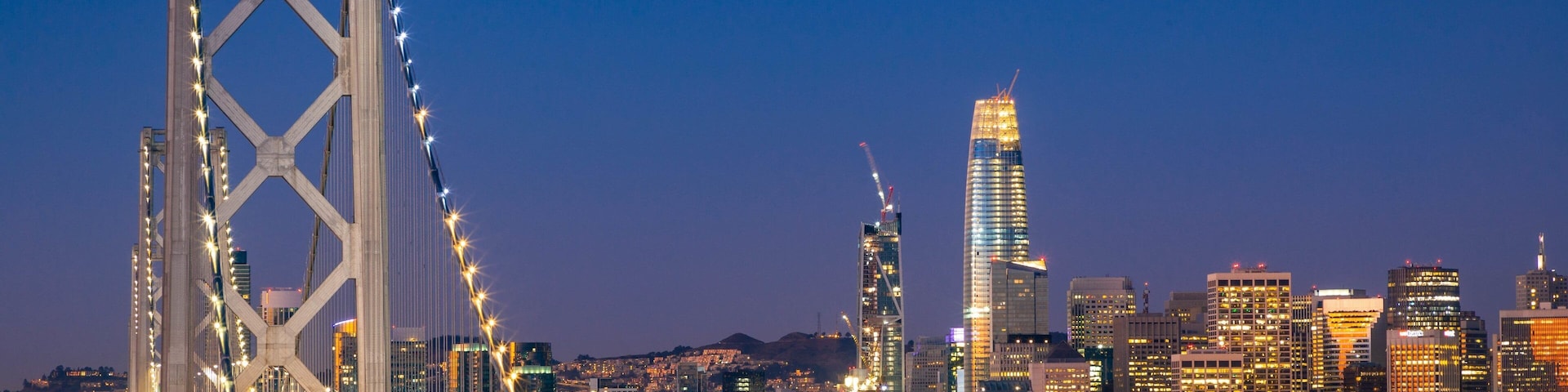 Bay Bridge showing a bridge, a bay or harbor and night scenes