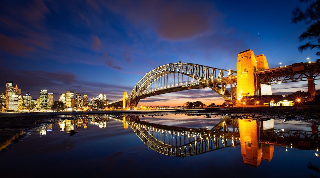 Sydney Harbour Bridge which includes night scenes, a bridge and a bay or harbor