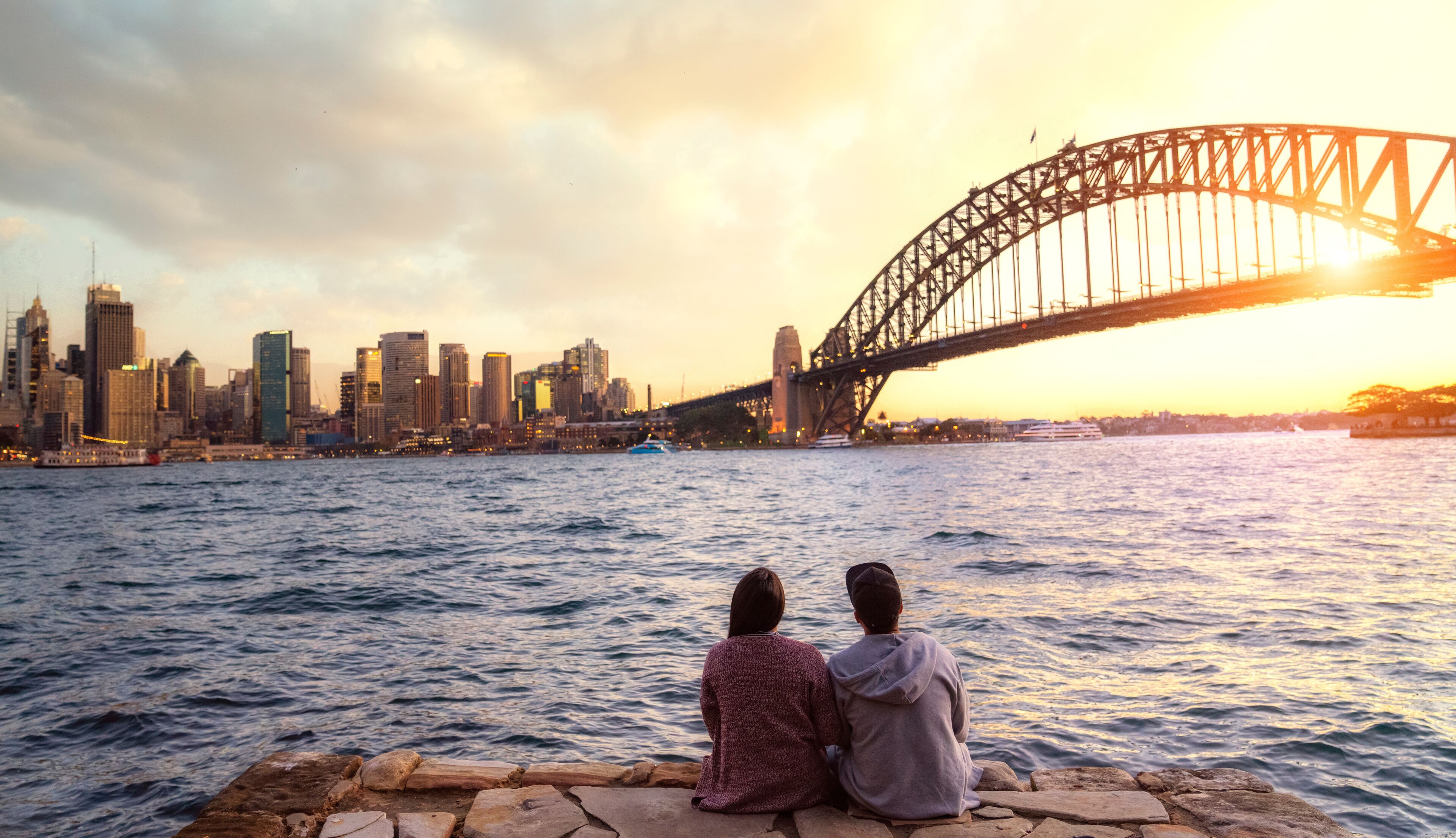 View point of Sydney harbour with city and bridge in sunset time