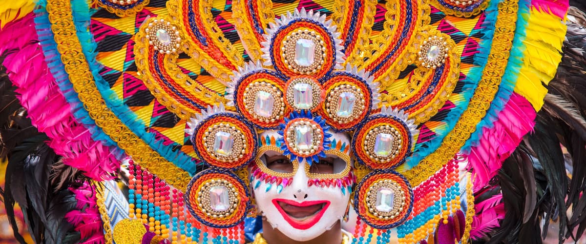 A colorful headdress with intricate beadwork and feathers.