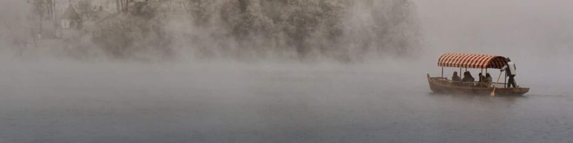 A cold winter's morning at Lake Bled. Walk around the lake and try to get different perspectives of the cathedral on the island. If you're lucky there will be some fog.