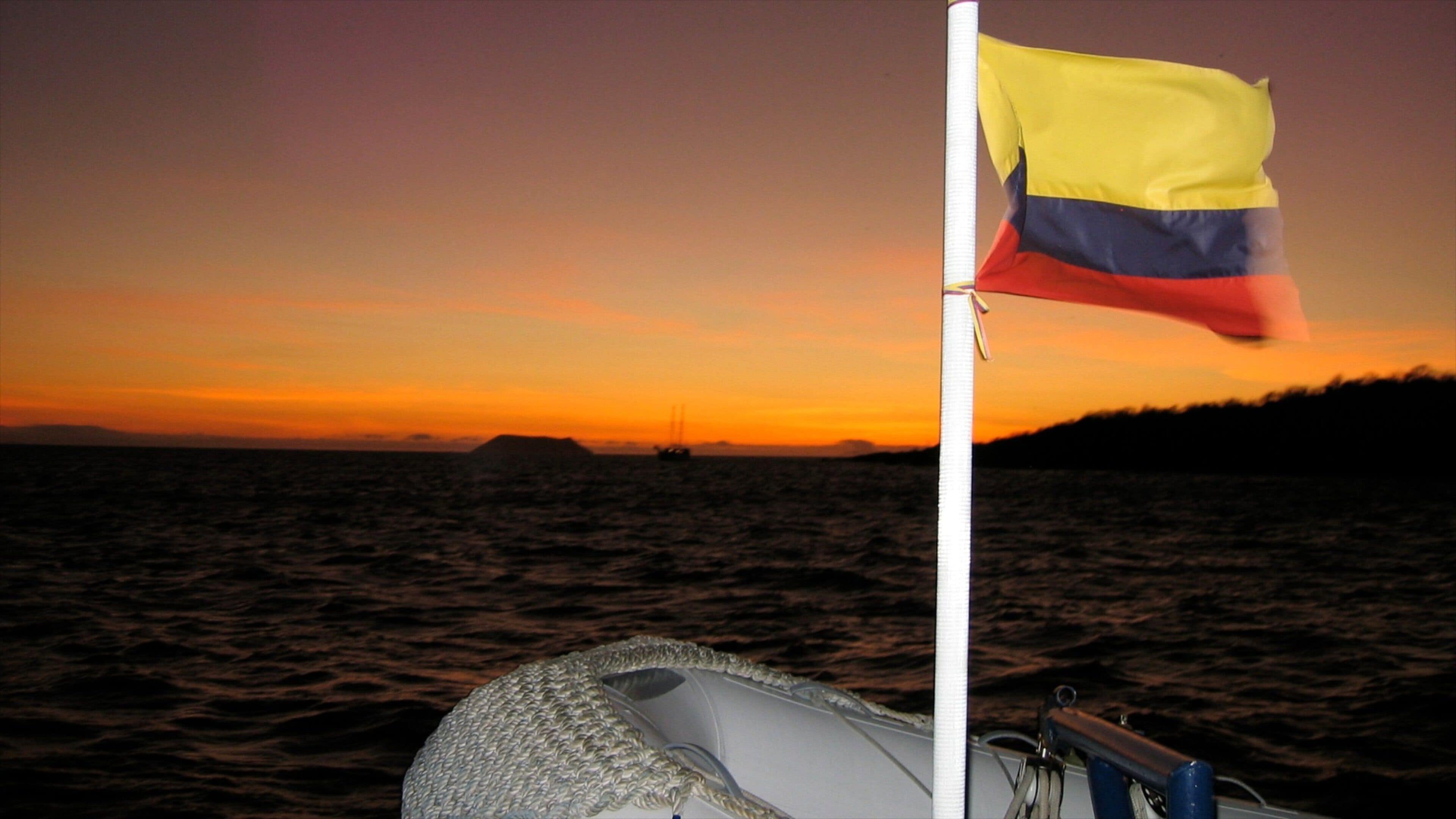Ecuador featuring a sunset and general coastal views