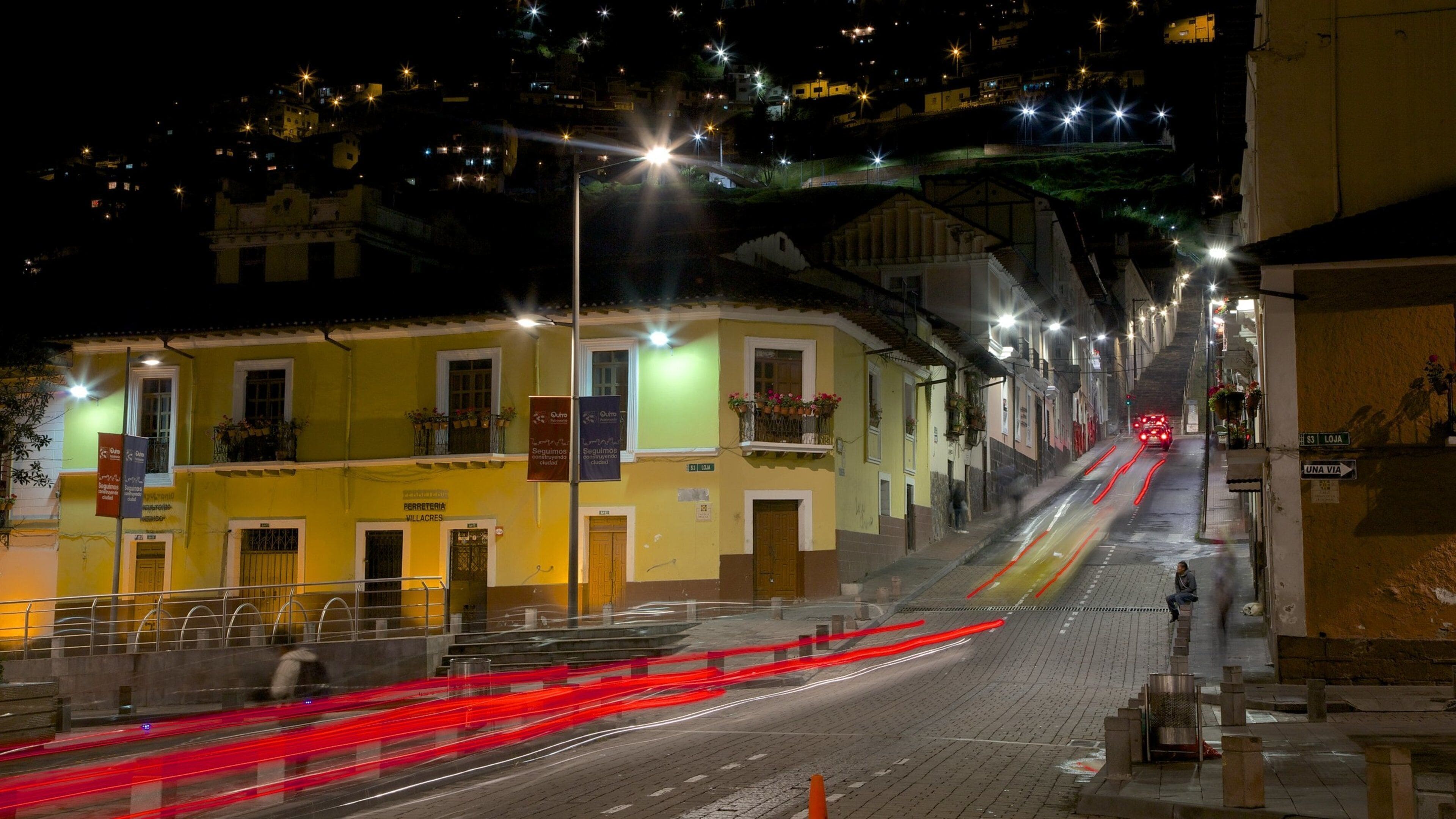 Ecuador featuring a city, night scenes and a house