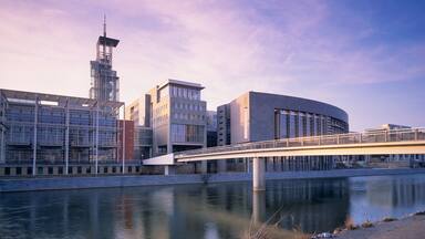 St. Pölten featuring a sunset, modern architecture and a bridge