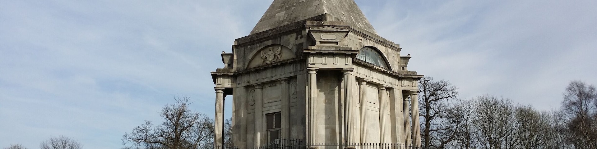 Darnley Mausoleum is a Grade 1 listed building located in the middle of Cobham Woods. Originally designed by James Wyatt for the 4th Earl of Darnley of Cobham Hall in 1783, it was never consecrated and so never used as a mausoleum. The architecture is classically inspired (the Earl may have wanted to replicate Roman/Greek temples seen on his travels across Europe) but has a unique pyramid roof. The building was heavily vandalised (including a stack of tyres placed inside and set alight) but later restored with the help of a lottery grant and was transferred to the National Trust in 2013 which now runs open days. It once featured on the TV show 'Restoration'.
There are great walks though the very, very old woodland here (beware roaming cattle in woods if you have a dog).