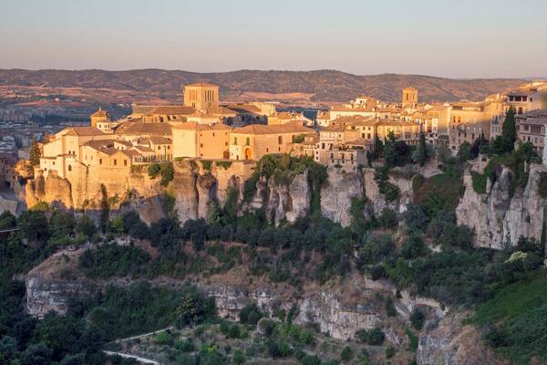 Sunrise at Mirador de la Hoz, Cuenca. Driving through the heart of Cuenca town, passing the Cathedral on your right, you continue up the road that your head says 'Are you sure we can do this?' This view opens up. Be aware that people will camp for this view and the gorge will end in your demise if you take a step too far but.... boy is it worth it. August... an ungodly hour but back in time for an early breakfast.