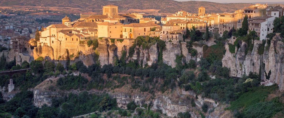 Sunrise at Mirador de la Hoz, Cuenca. Driving through the heart of Cuenca town, passing the Cathedral on your right, you continue up the road that your head says 'Are you sure we can do this?' This view opens up. Be aware that people will camp for this view and the gorge will end in your demise if you take a step too far but.... boy is it worth it. August... an ungodly hour but back in time for an early breakfast.