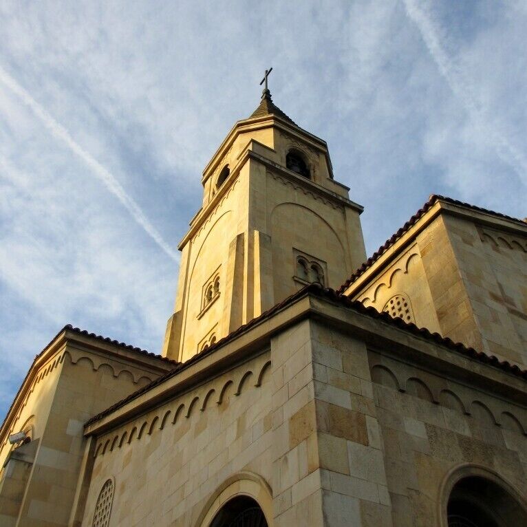 Walk along Gijón's beautiful seafront at sunset to get a breath of fresh sea air in the city. This pretty church is just the icing on the cake. 

More info: http://holayessica.com/2013/09/18/wisw-gijon-sunset/