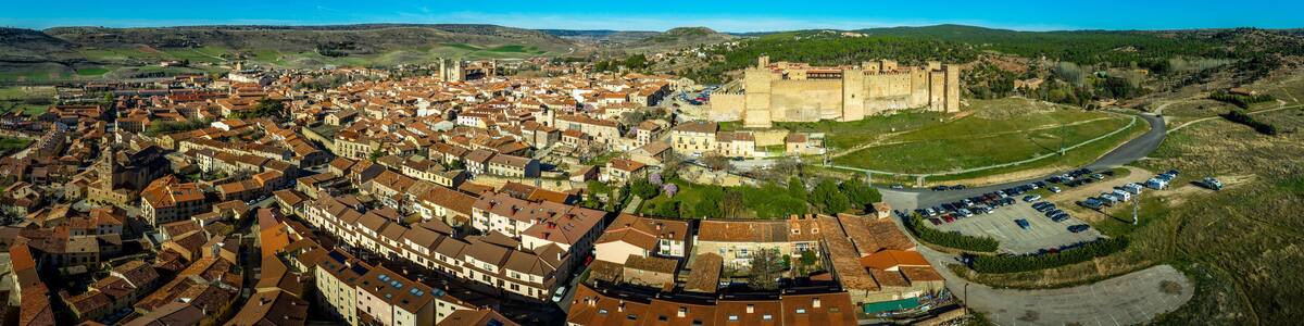 Siguenza aerial panorama of castle and town with blue sky in Spain