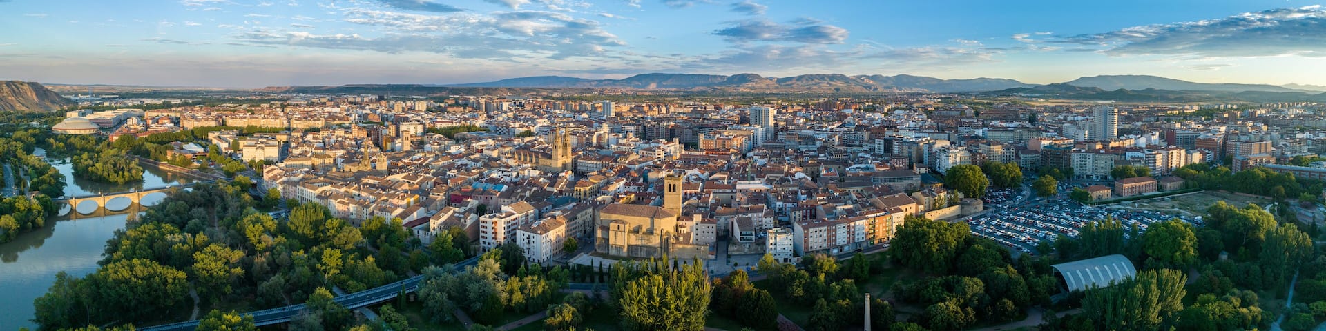Aerial view of Logrono is Rioja Spain, medieval walled city center, ravelin, gothic cathedral along the Ebro river with sunset sky