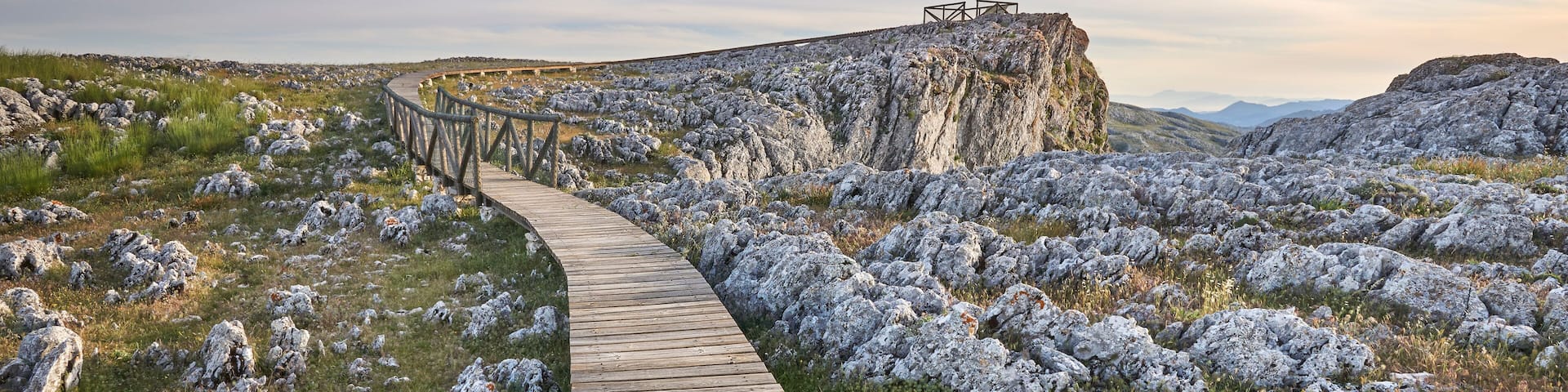 wooden footbridge over limestone rock landscape in Loja, Granada. Spain