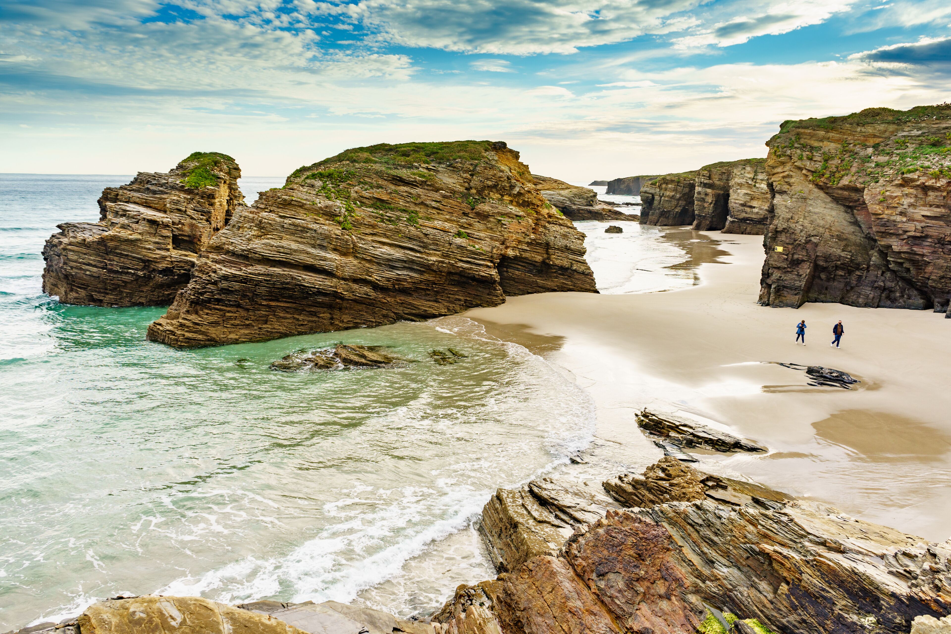 People walking on Beach Cathedrals Beach, Galicia Spain.
