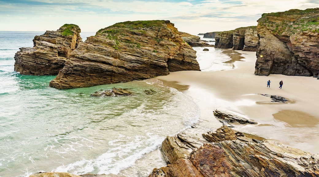 People walking on Beach Cathedrals Beach, Galicia Spain.