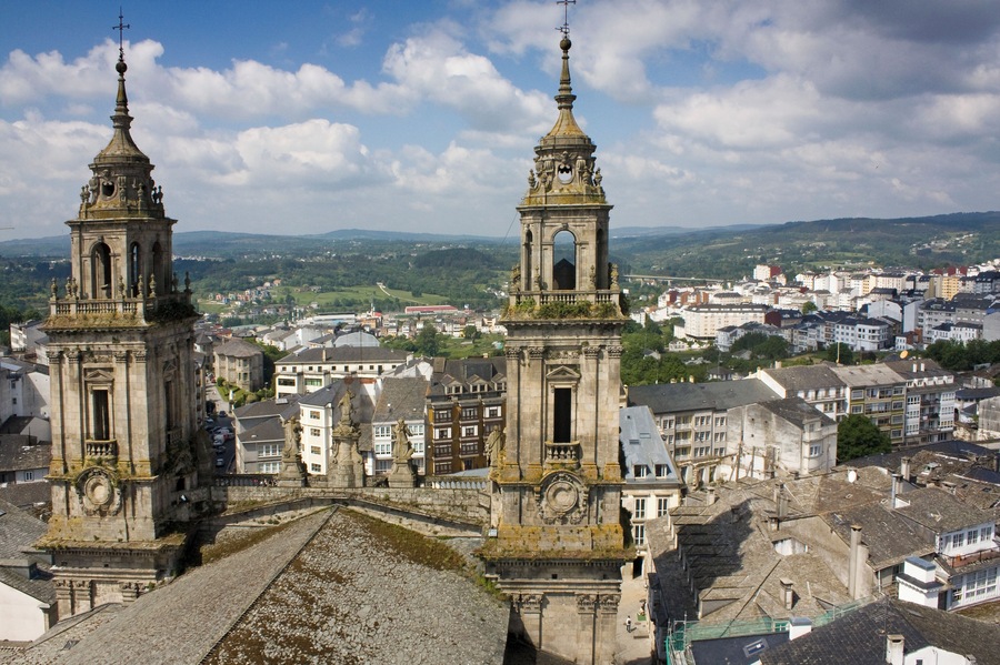Towers of Lugo cathedral and cityscape.